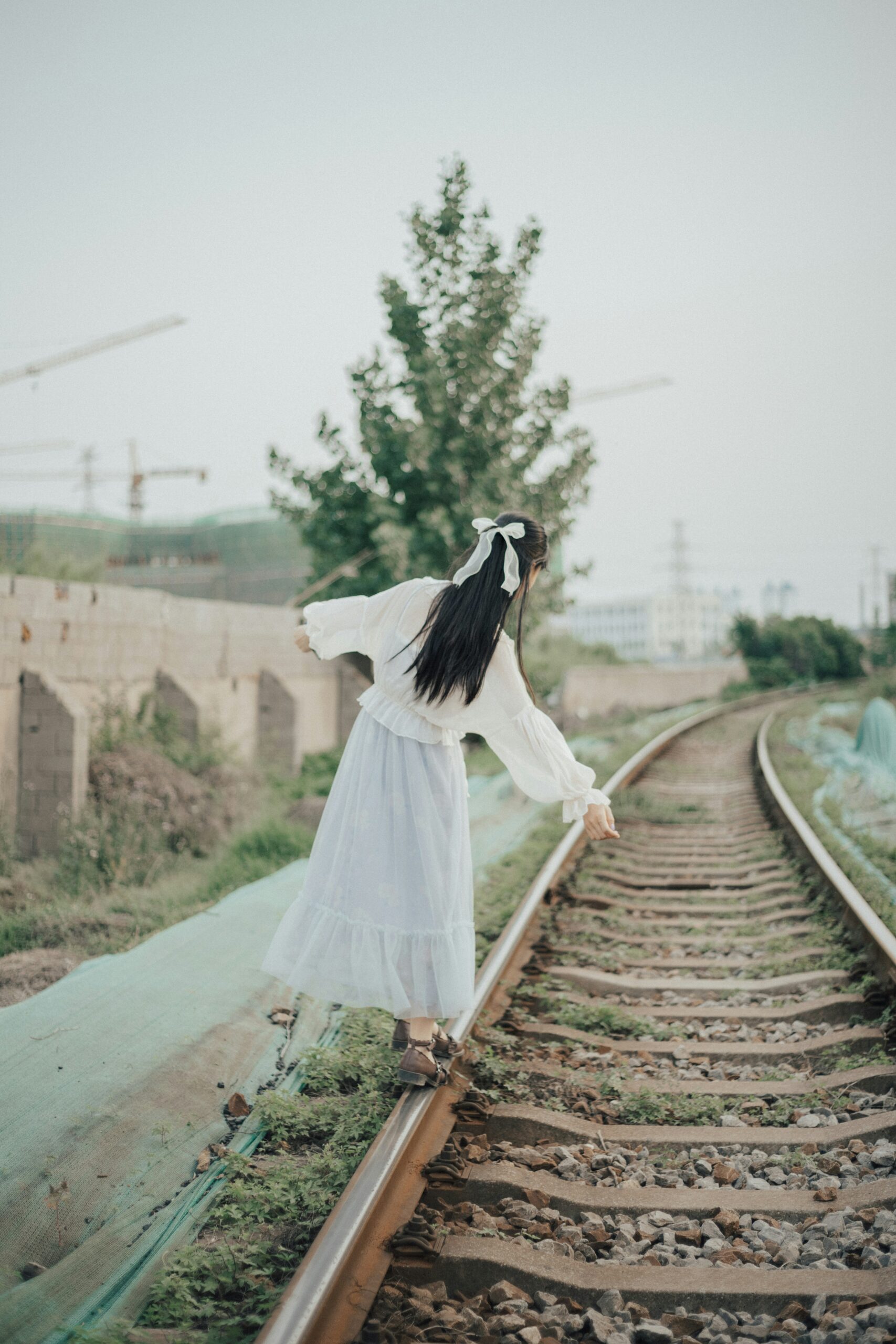 Off the beaten track while traveling – traveler walking on a quiet village path
